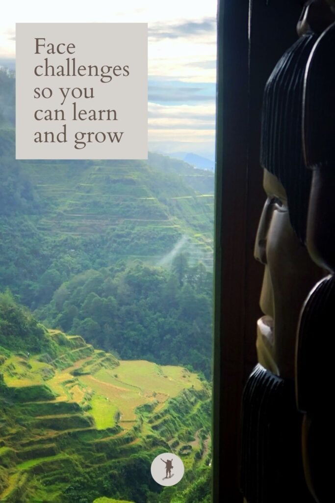 Sagada is Worth Visiting: Why I Can’t Wait to Return 5 Face challenges so you can learn and grow, quote, face wood carving and a view of Banaue Rice Terraces near Sagada