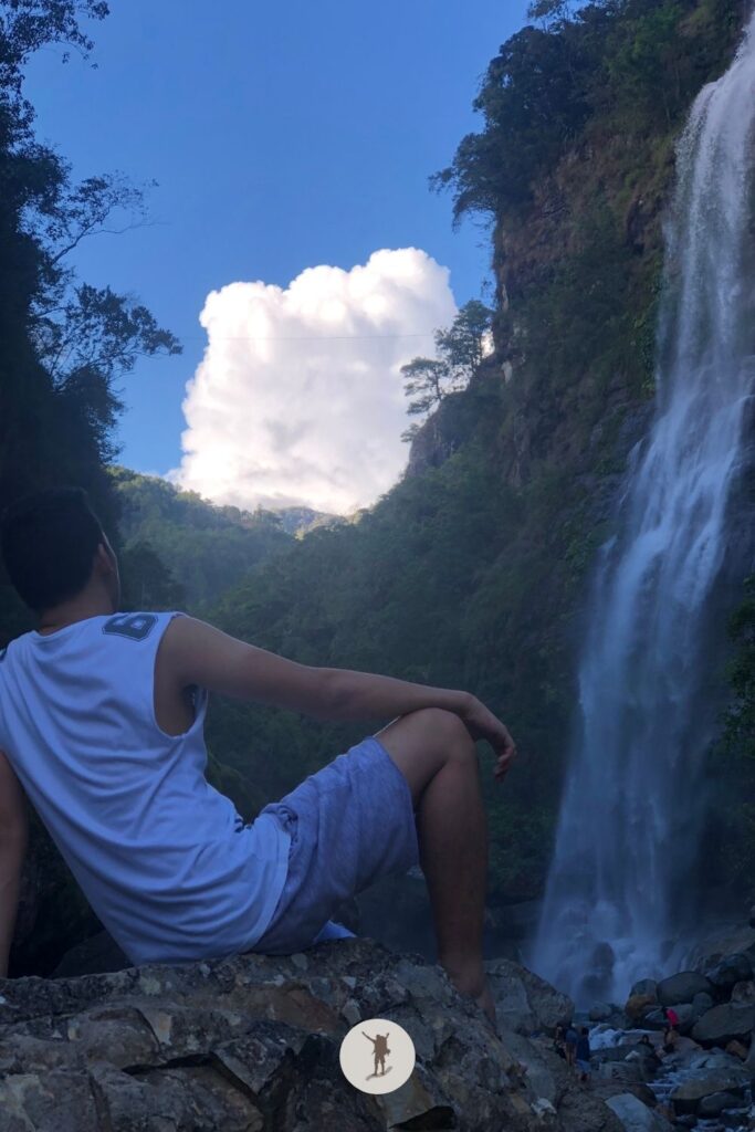 Me marveling at Bomod-Ok Falls In Sagada, Philippines