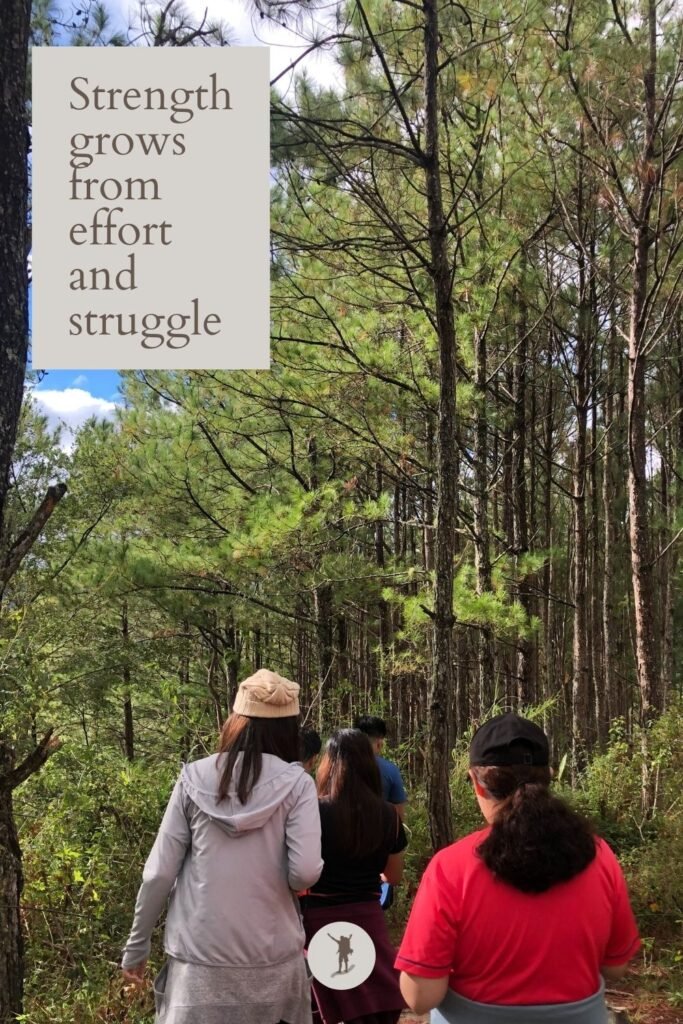 Sagada is Worth Visiting: Why I Can’t Wait to Return 7 Strength grows from effort and struggle, quote, hiking trail with pine trees and travelers in Sagada