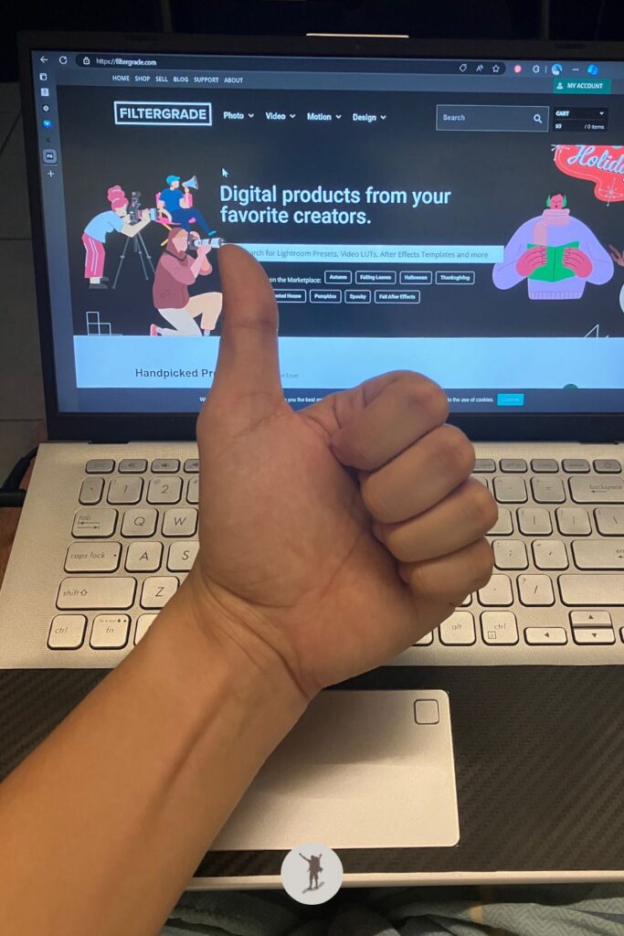 My laptop screen is displaying the homepage of FilterGrade