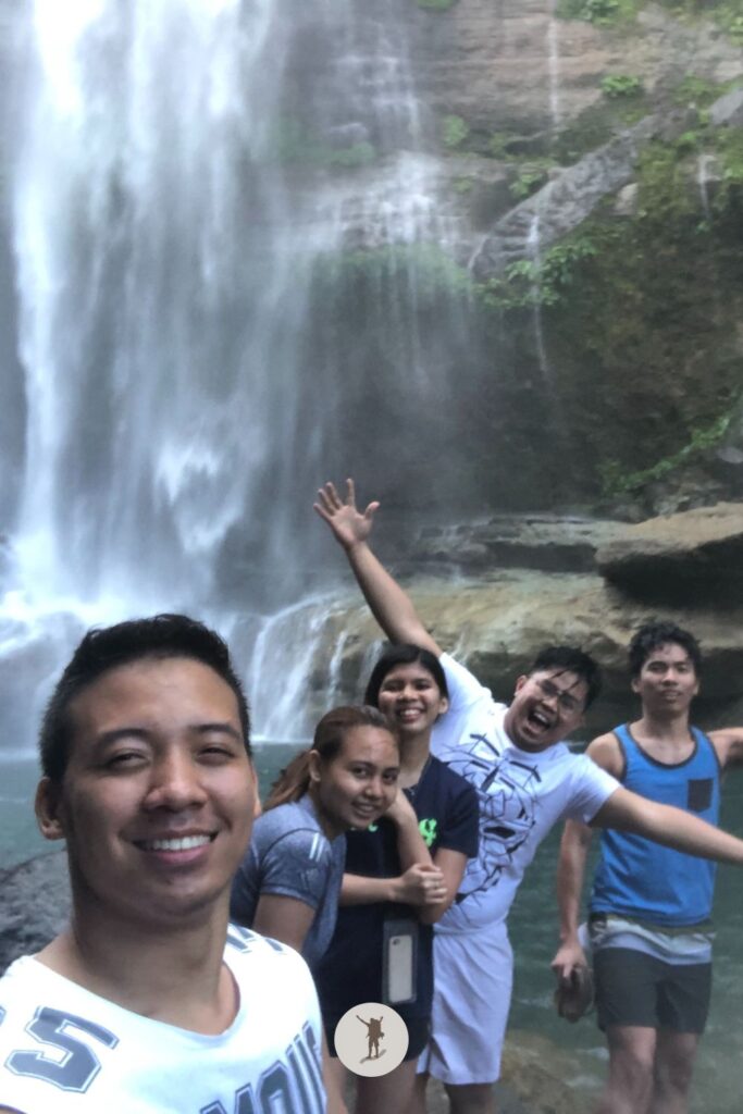 My friends and me near the plunge pool of Bomod-Ok Falls in Sagada, Philippines