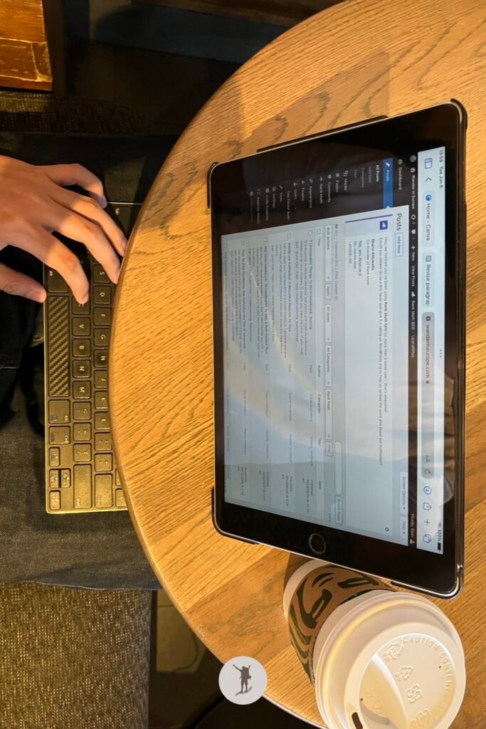 Struggles of Building an Online Business From Coffee Shops and How to Handle Them 2 Blogging in Starbucks, keyboard on my lap, iPad on the table
