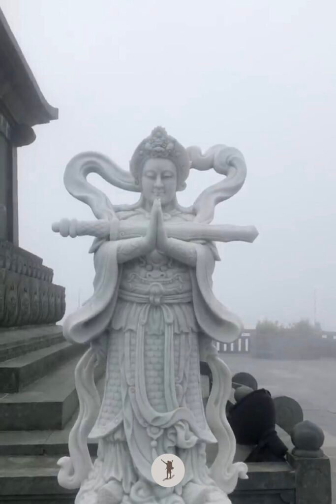 Reality vs Expectation of Visiting Fansipan from Sa Pa: How You Can Avoid Disappointments 31 Beautiful Buddhist statue praying in Fansipan, Sa Pa, Vietnam