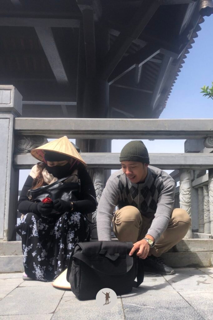 Reality vs Expectation of Visiting Fansipan from Sa Pa: How You Can Avoid Disappointments 35 Eljon and friend enjoying a short period of sunlight in Fansipan, Sa Pa, Vietnam