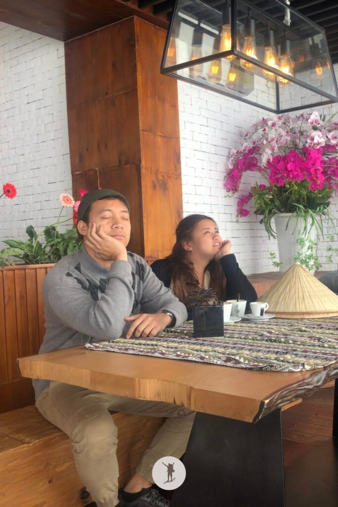 Reality vs Expectation of Visiting Fansipan from Sa Pa: How You Can Avoid Disappointments 26 Eljon and friend relaxing during the cold adventure in Fansipan, Sa Pa, Vietnam