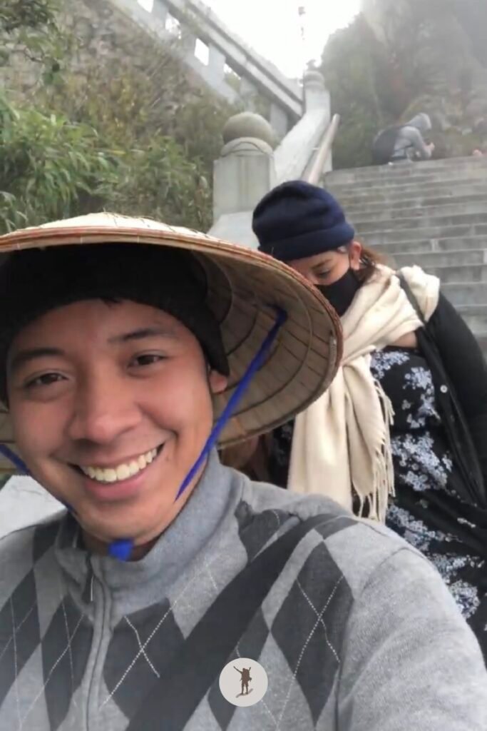 Reality vs Expectation of Visiting Fansipan from Sa Pa: How You Can Avoid Disappointments 36 Eljon smiling even when it rains in Fansipan, Sa Pa, Vietnam