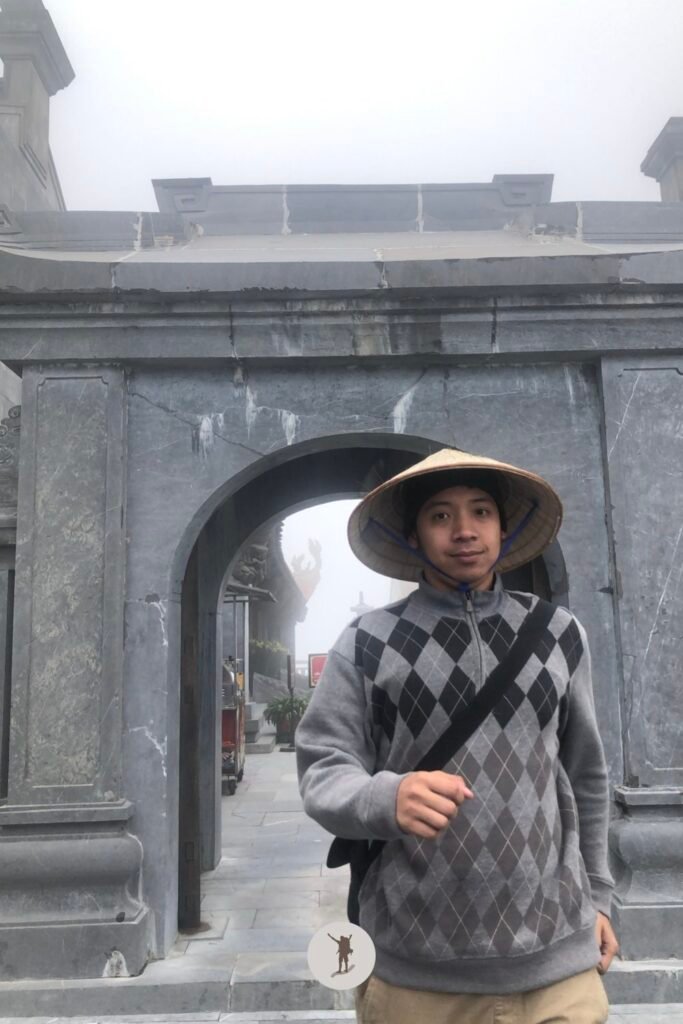 Reality vs Expectation of Visiting Fansipan from Sa Pa: How You Can Avoid Disappointments 28 Happy me with the sweater I brought to combat the cold in Fansipan, Sa Pa, Vietnam