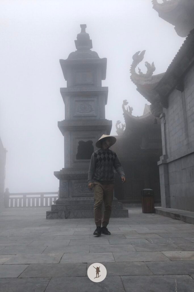 Reality vs Expectation of Visiting Fansipan from Sa Pa: How You Can Avoid Disappointments 30 The view of the temple in Fansipan when it rains, Sa Pa, Vietnam