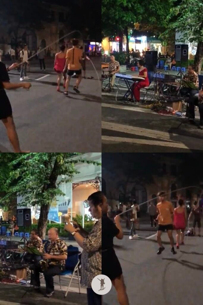 Bands playing traditional music and teens performing during Hanoi Walking Street, Hanoi, Vietnam
