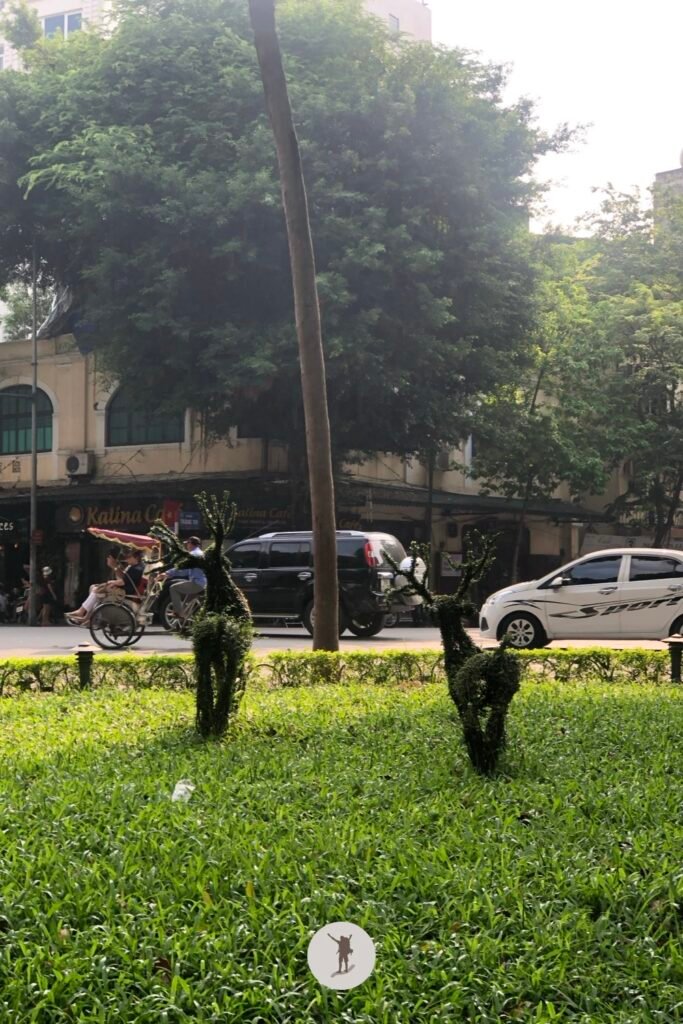 Bush sculptures of deers in a garden beside Hoan Kiem Lake in Hanoi, Vietnam