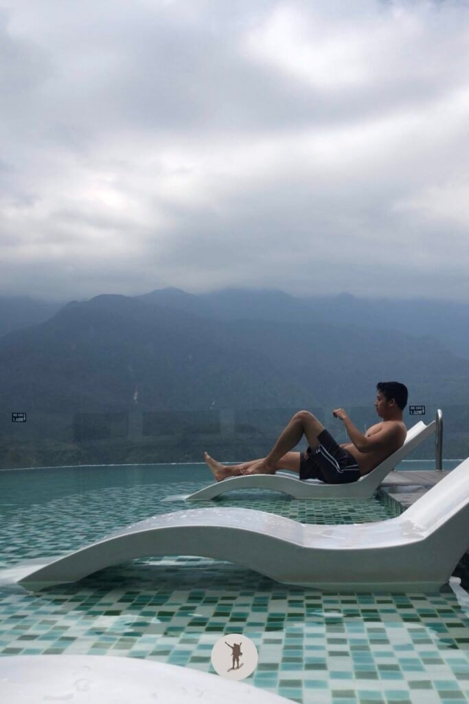 Bamboo Sa Pa Hotel: Why It’s Worth Staying If You Want the Views and Relaxation 15 Me relaxing at the pool of Bamboo Sa Pa hotel, Sa Pa, Vietnam
