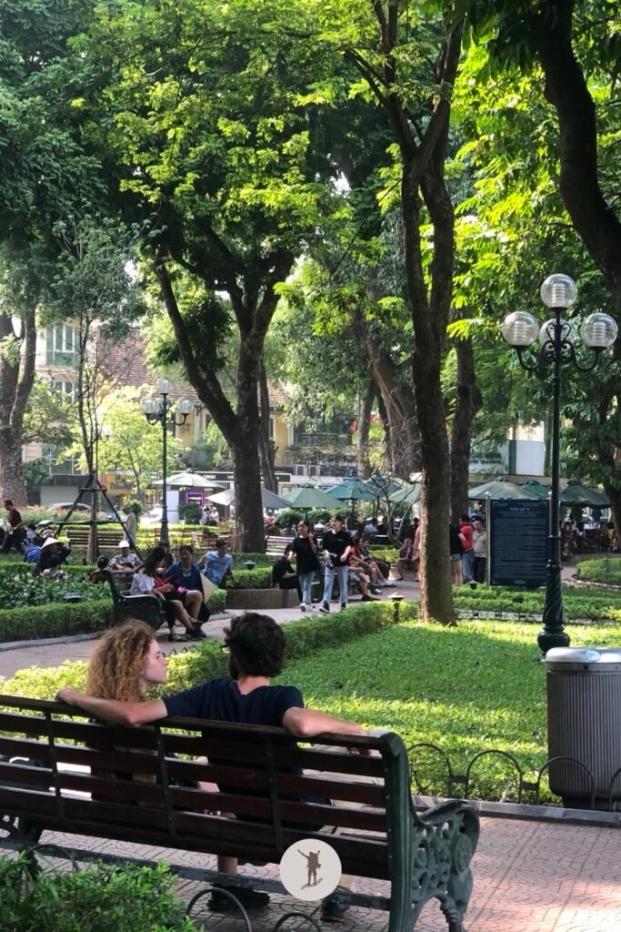 People dating and enjoying the view of Hoan Kiem Lake in Hanoi, Vietnam