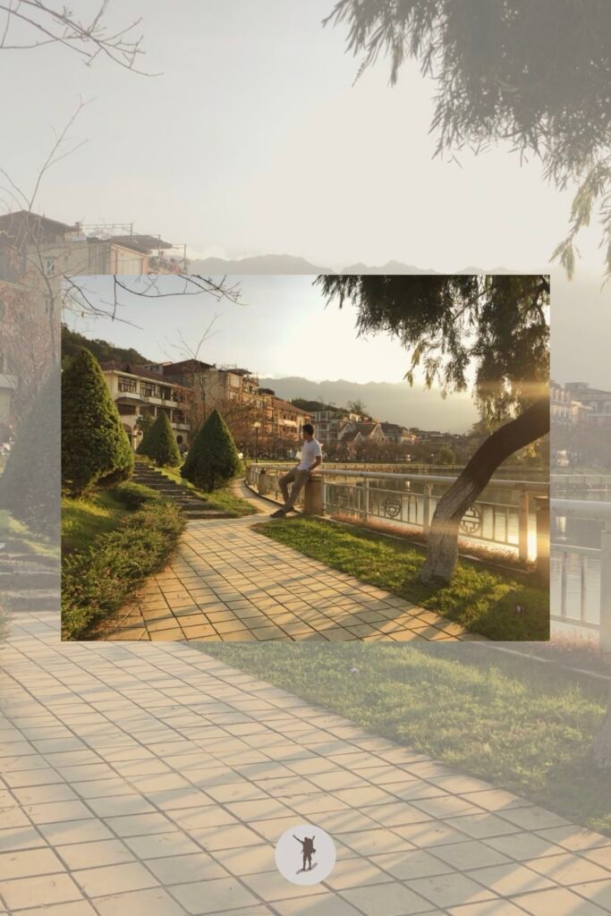 The lake, the shore, and the buildings, a view from a photo spot along Lake Sa Pa, Vietnam