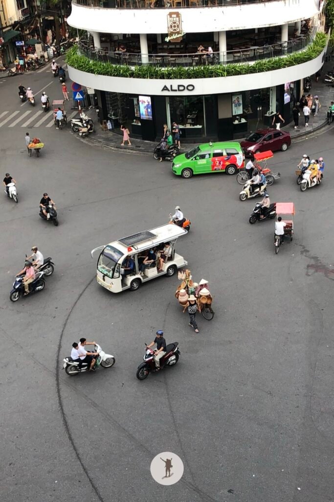 View of Dong Kinh Nghia Thuc with the motorcycles and other vehicles Hanoi, Vietnam