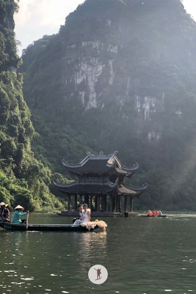 A couple having their pre-nup photos in front of Thuy Dinh Temple in Trang An, Ninh Binh, Vietnam