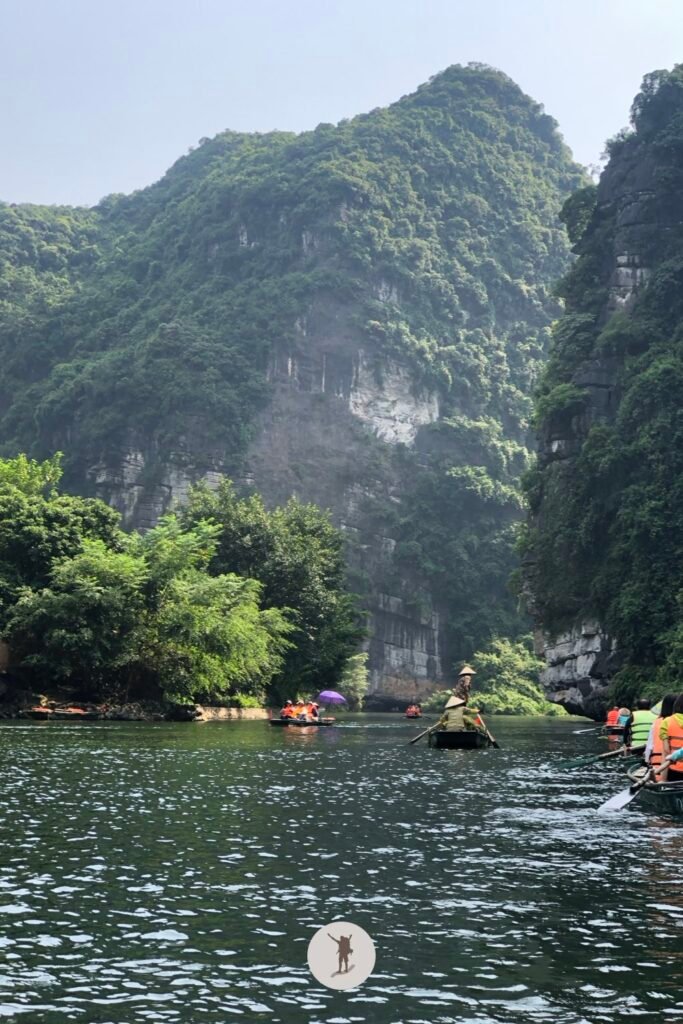 A spectacular view of the karst including the boats and river in Trang An, Ninh Binh, Vietnam