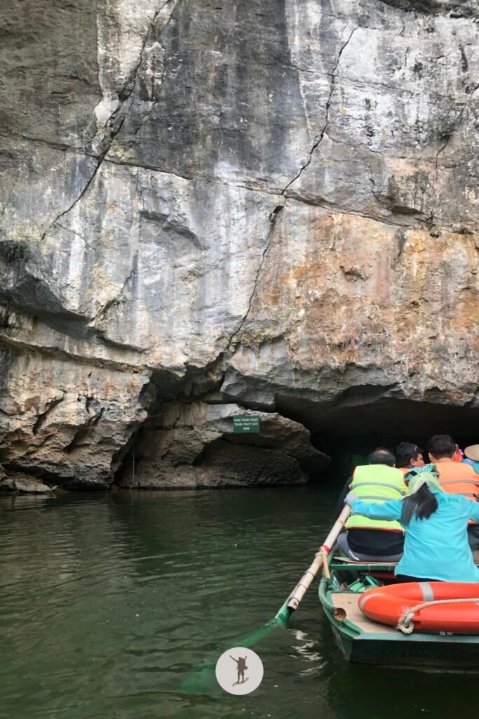 Another view of the tourists entering the cave in Trang An, Ninh Binh, Vietnam