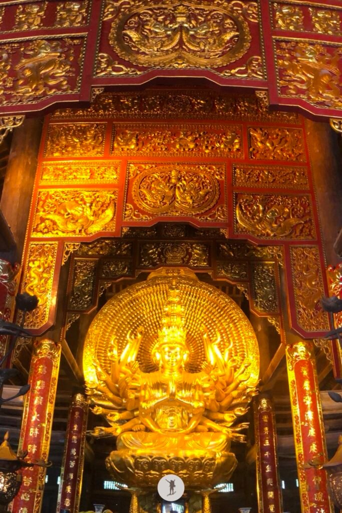 Golden Buddha inside one of the halls of Bai Dinh Pagoda, Ninh Binh, Vietnam