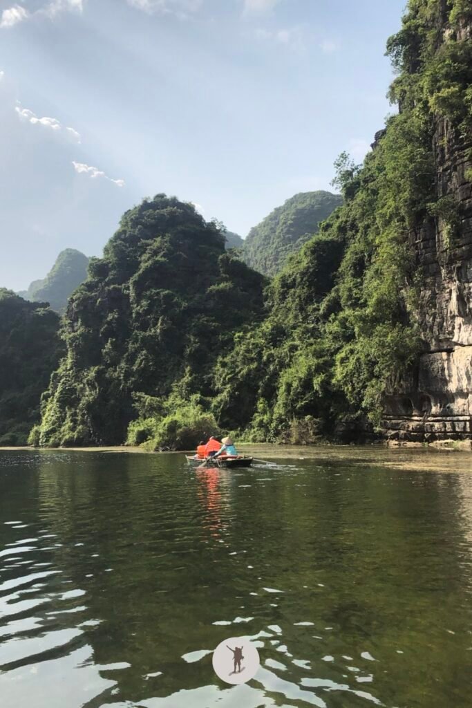 Rising karst mountains from left to right in Trang An, Ninh Binh, Vietnam