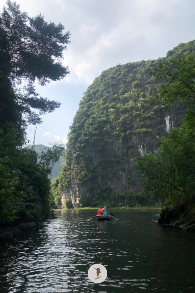 View of the mountains from the river in Trang An in Ninh Binh, Vietnam