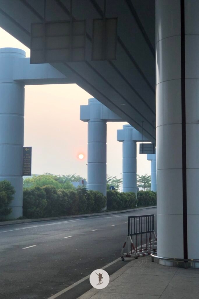 Sunrise view outside Noi Bai International Airport while waiting for Bus 86 to arrive, Hanoi, Vietnam