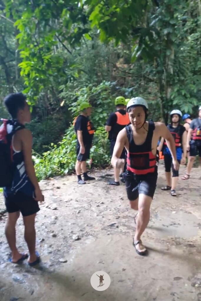 A photo of me running to create a momentum before doing a 10-meter cliff jump in Kawasan Falls canyoneering, Cebu, Philippines