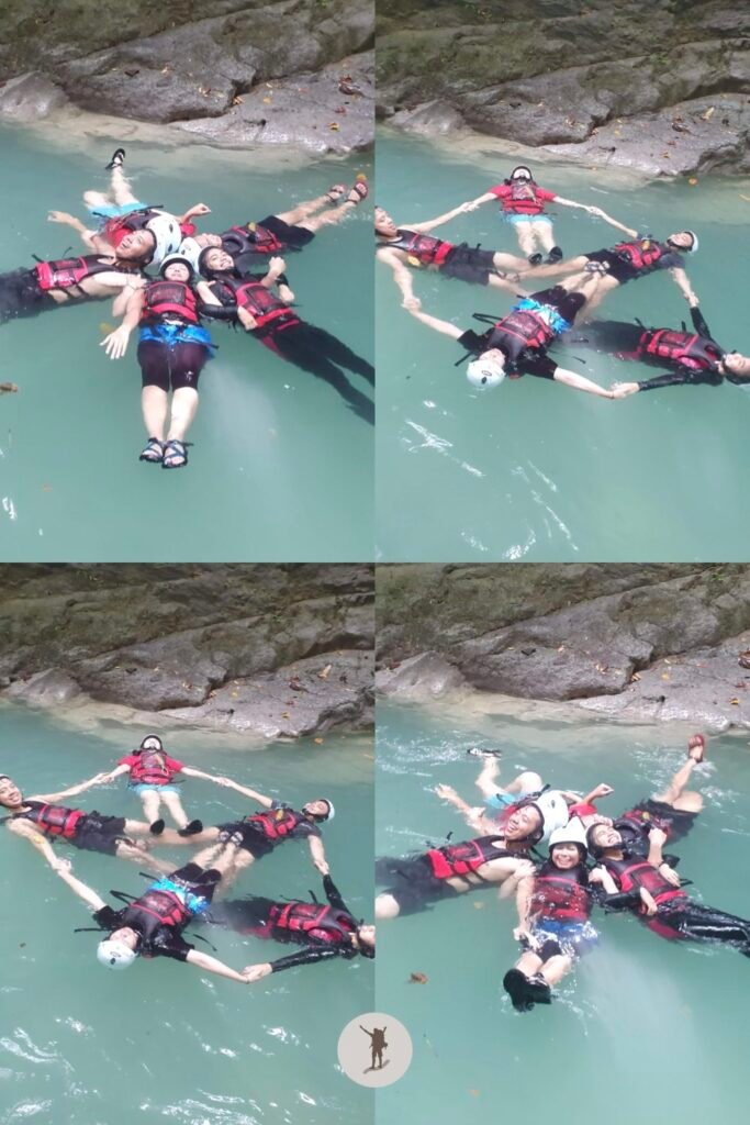 Crazy group position as we drift to the next part of the course after the 7-meter cliff jump in Kawasan Falls Canyoneering, Cebu, Philippines
