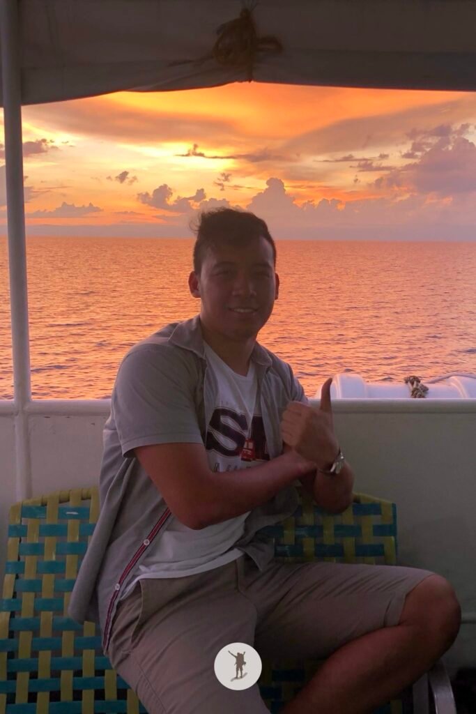 Me in front of the beautiful sunset while riding the ferry to Cebu City from Bohol during our five day Bohol-Cebu trip, Central Visayas, Philippines