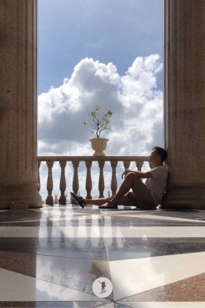 Me sitting between the massive columns of The Temple of Leah, Cebu City, Cebu, Philippines
