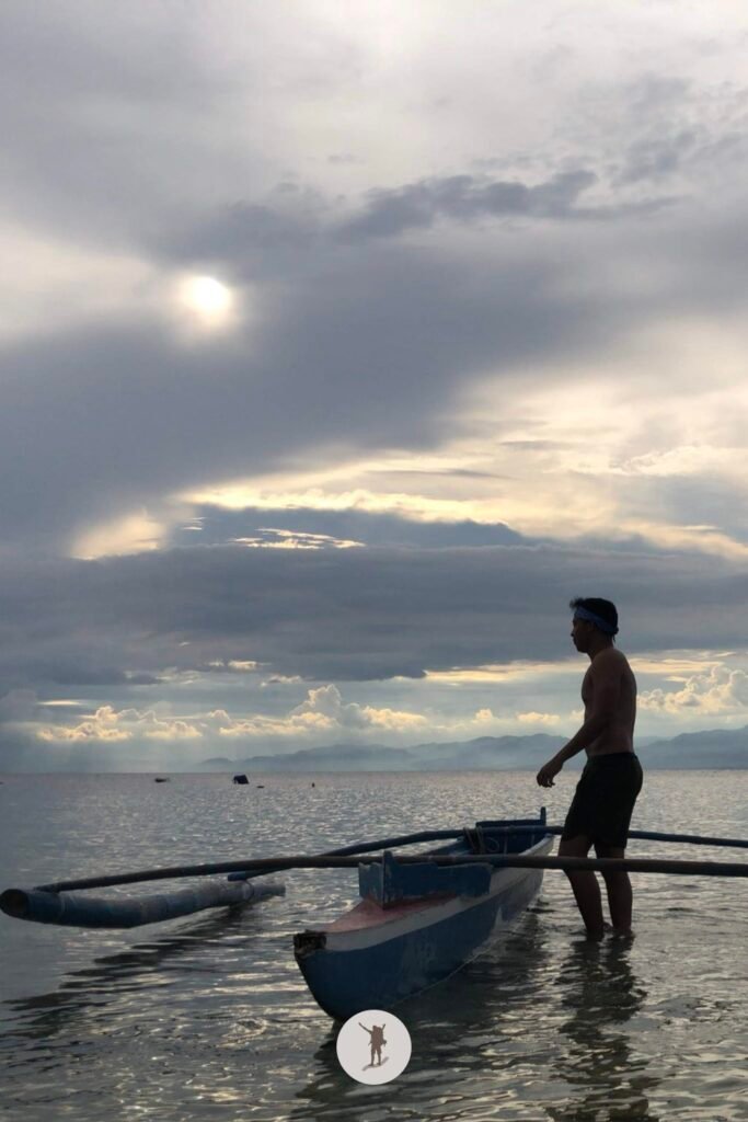 Me taking the boat as we wait for the sunset in Moalboal, Cebu, Philippines