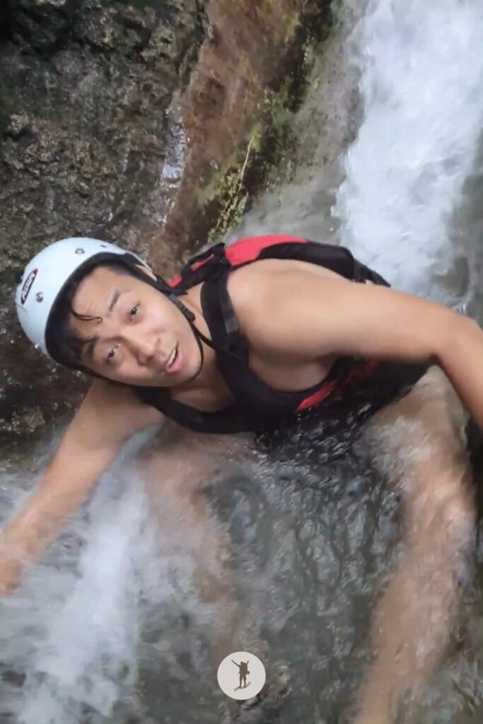 Part 1, me sliding down the last and longest slide near the end of Kawasan Falls Canyoneering, Cebu, Philippines