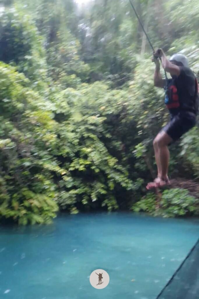 Part 2, my friend taking the rope swing near the end of Kawasan Falls Canyoneering, Cebu, Philippines