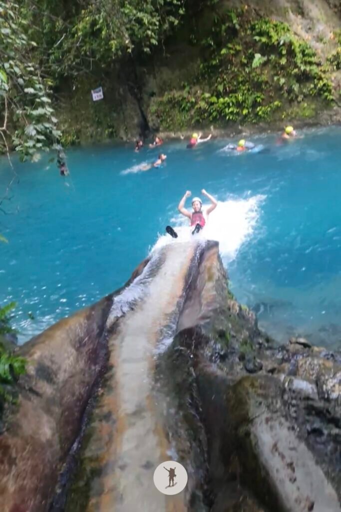 Part 4, me sliding down the last and longest slide near the end of Kawasan Falls Canyoneering, Cebu, Philippines
