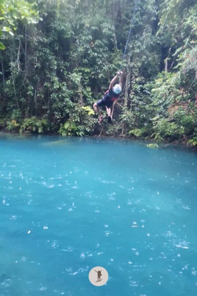 Part 4, my friend taking the rope swing near the end of Kawasan Falls Canyoneering, Cebu, Philippines
