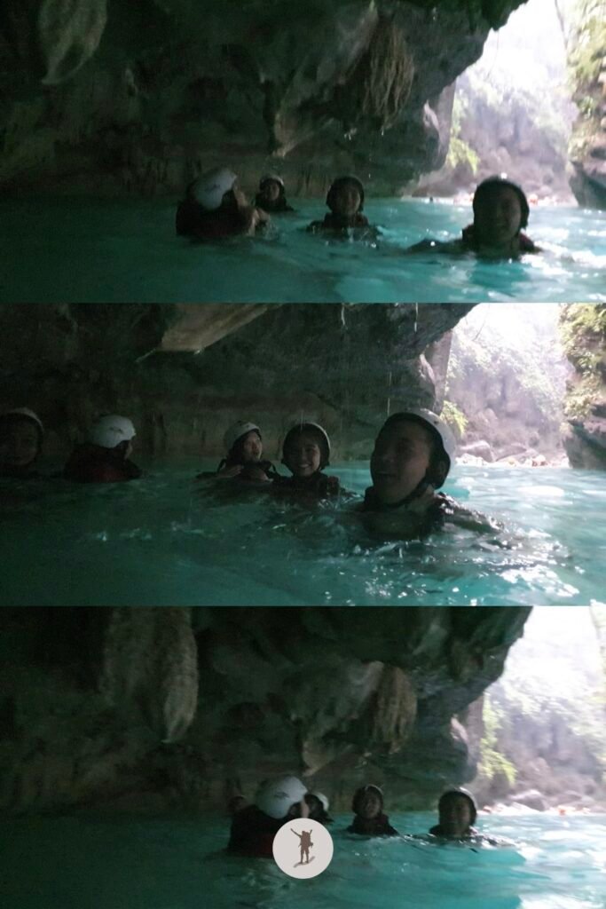 Picture of the group marveling at the rock formation above us after the 7-meter cliff jump in Kawasan Falls canyoneering, Cebu, Philippines