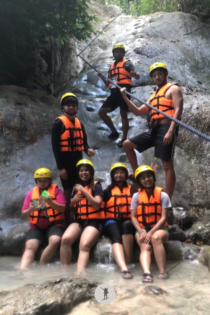 The group starting the trek in Dao Falls in Samboan, Cebu, Philippines