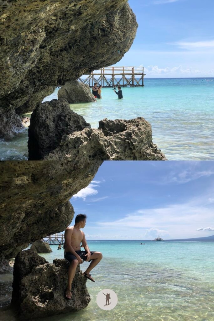 The picture-perfect view from a small cave of Sumilon Island, near Oslob, Cebu, Philippines