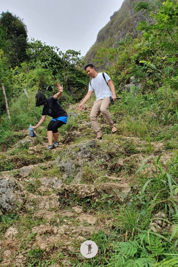 Our Expectation vs. Reality Hiking Osmeña Peak in Cebu and Tips Before You Hike 25 A candid photo of me and my friend on our way down from Osmena Peak, Cebu, Philippines