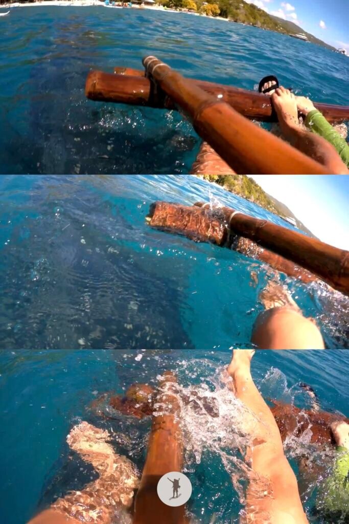 Our Whale Shark Watching Experience in Oslob, Cebu, and Our Tips for First-Time Visitors 29 A picture of us putting our feet above the water because a whale shark swam directly below us in Oslob, Cebu, Philippines