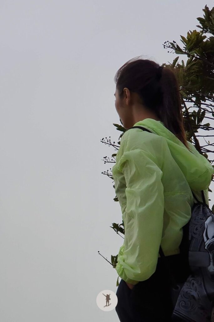 Our Expectation vs. Reality Hiking Osmeña Peak in Cebu and Tips Before You Hike 14 Another friend staring at the clouds imagining the supposed stunning view from Osmena Peak, Cebu, Philippines