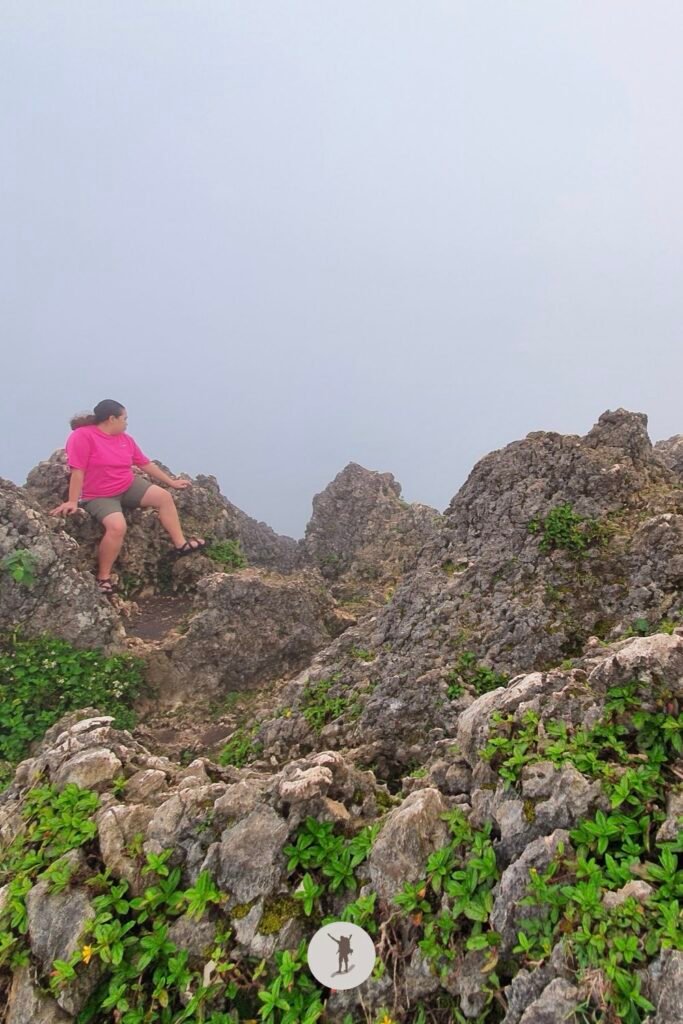 Our Expectation vs. Reality Hiking Osmeña Peak in Cebu and Tips Before You Hike 12 Another friend waiting for a clearing to see the view from Osmena Peak, Cebu, Philippines