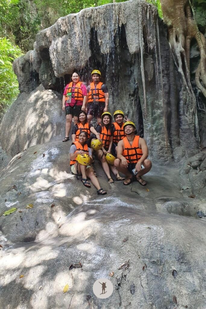 Another mandatory group photo at another beautiful rock formation in Aguinid Falls, Cebu, Philippines