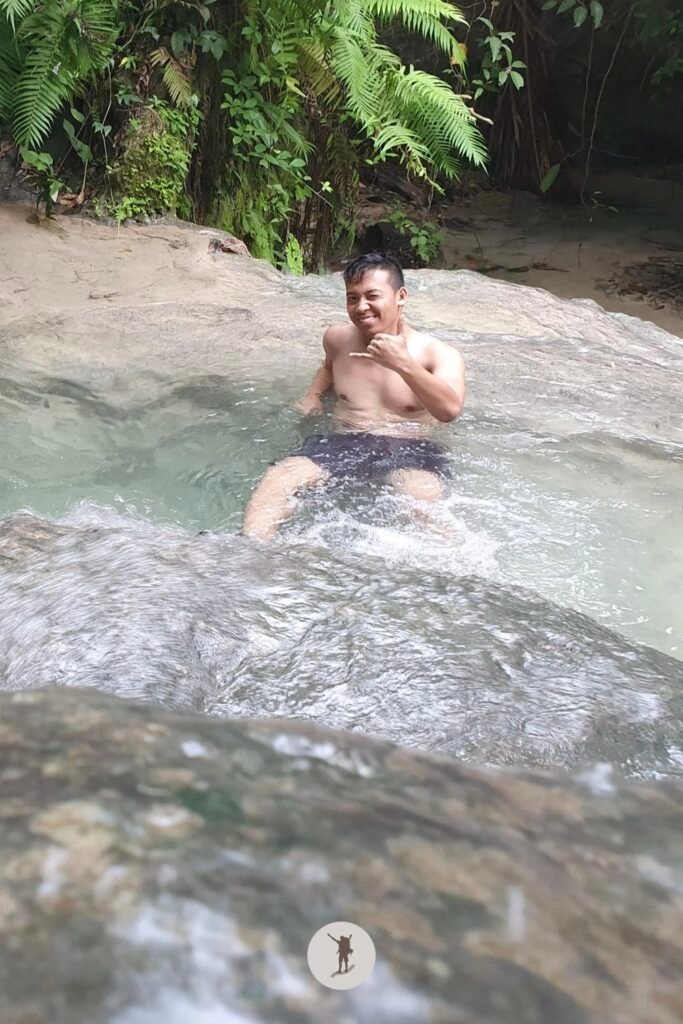 Me soaking in the water near the end of our adventure at Aguinid Falls, Cebu, Philippines