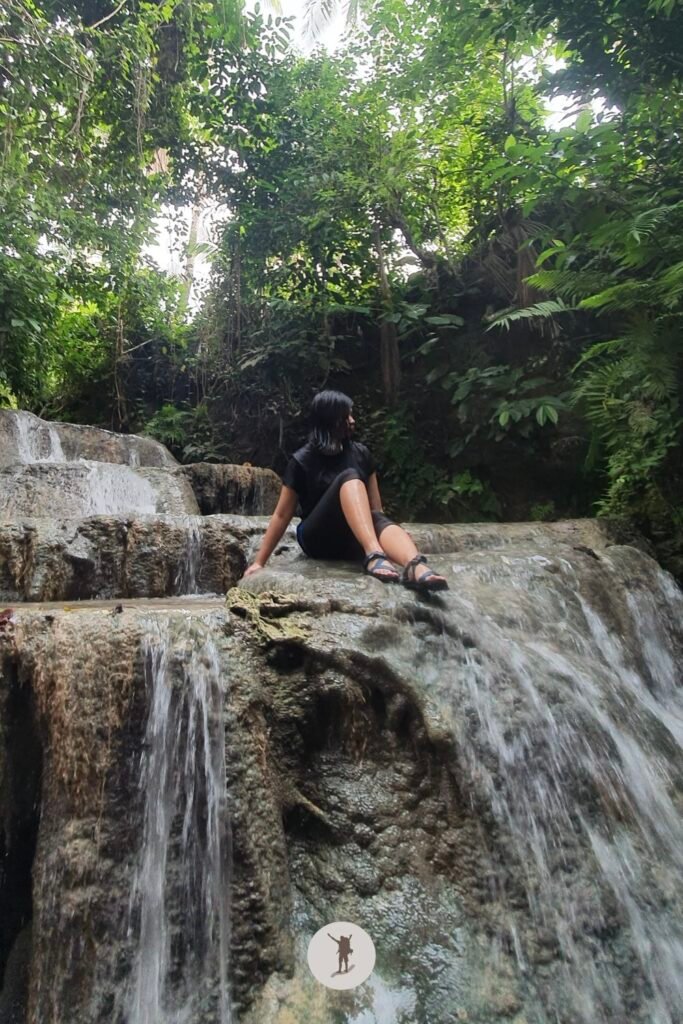 My friend posing at the tiers and tiers of cascades in Aguinid Falls, Cebu, Philippines