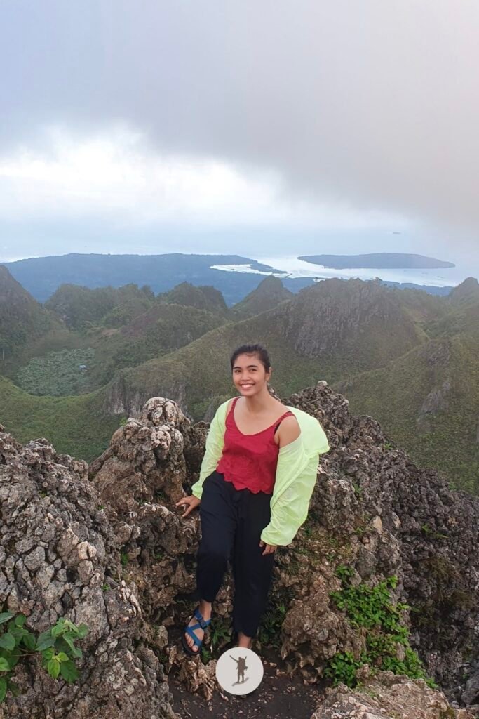 Our Expectation vs. Reality Hiking Osmeña Peak in Cebu and Tips Before You Hike 17 My lucky friend who managed to take a selfie with the iconic view from Osmena Peak, Cebu, Philippines