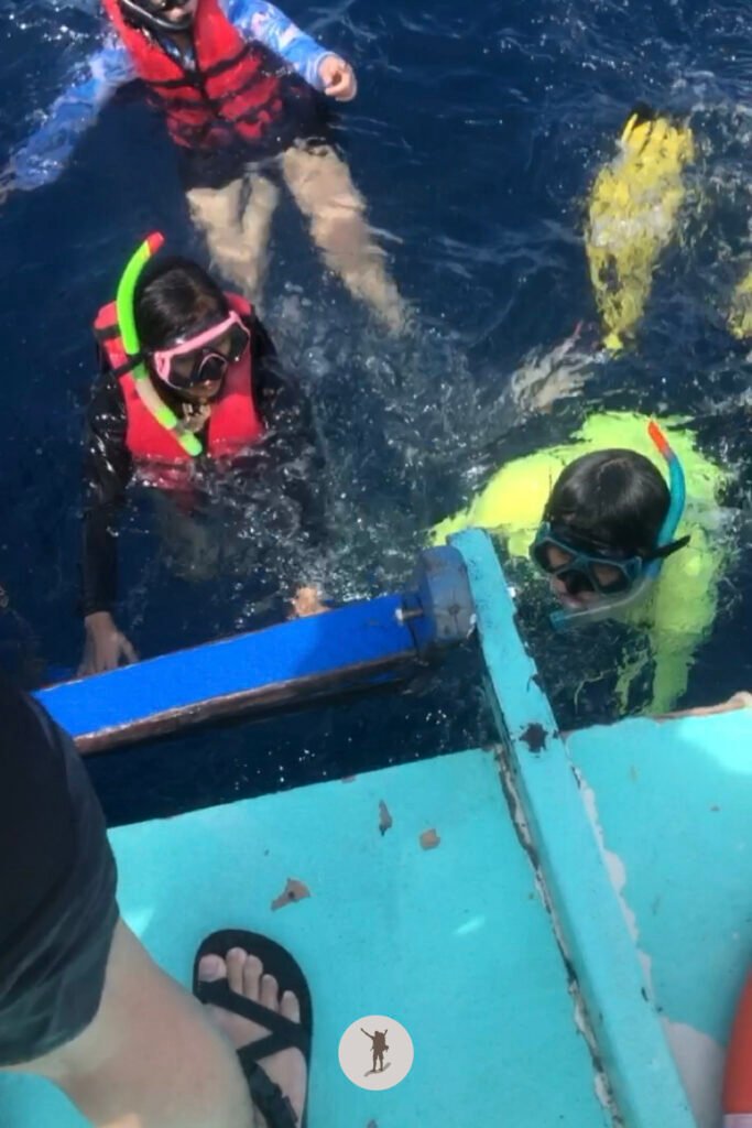 Our first dip in the water during our sardine run snorkeling boat tour in Moalboal, Cebu, Philippines