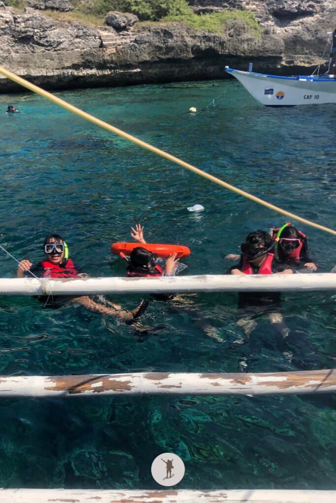 Our happiness before we start our snorkeling tour on Pescador Island, near Moalboal, Cebu, Philippines