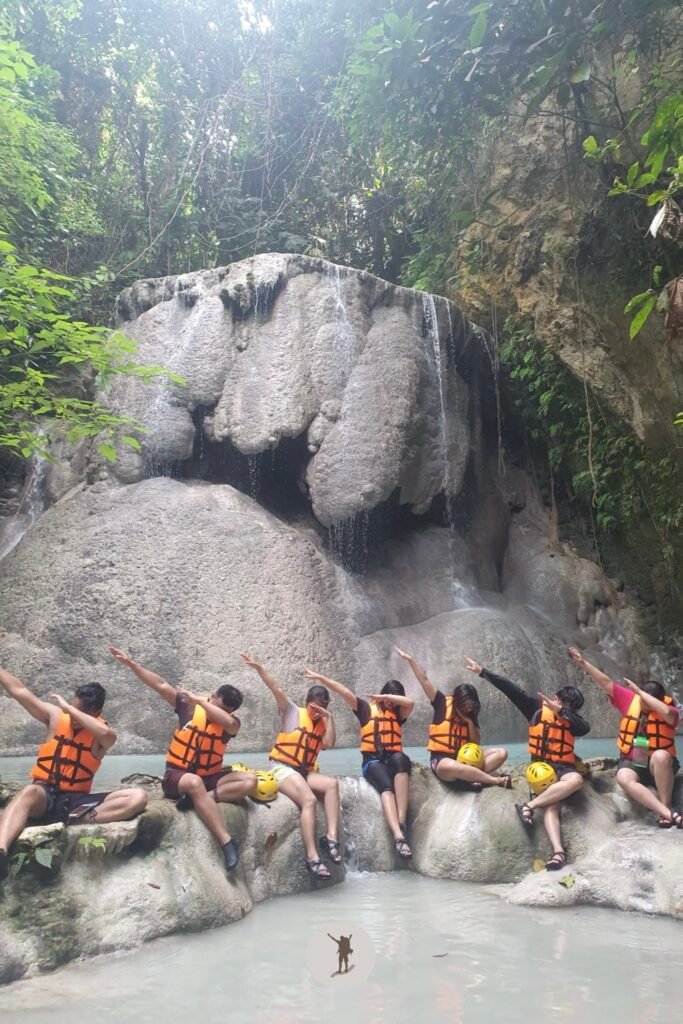 The classic dab pose of our group in front of the most beautiful part of Aguinid Falls, Cebu, Philippines