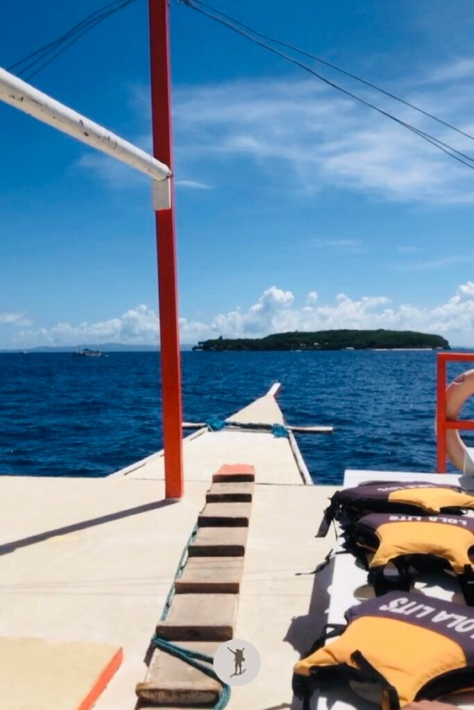 Our Beautiful Experience Visiting Sumilon Island After Whale Shark Watching in Oslob 13 The view of Sumilon Island from our boat, Oslob, Cebu, Philippines