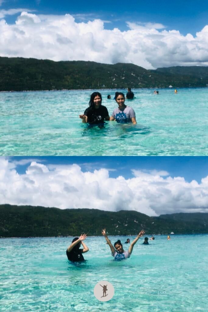 Our Beautiful Experience Visiting Sumilon Island After Whale Shark Watching in Oslob 29 Two of the girls of our travel group in the crystal clear water of Sumilon Island, Oslob, Cebu, Philippines